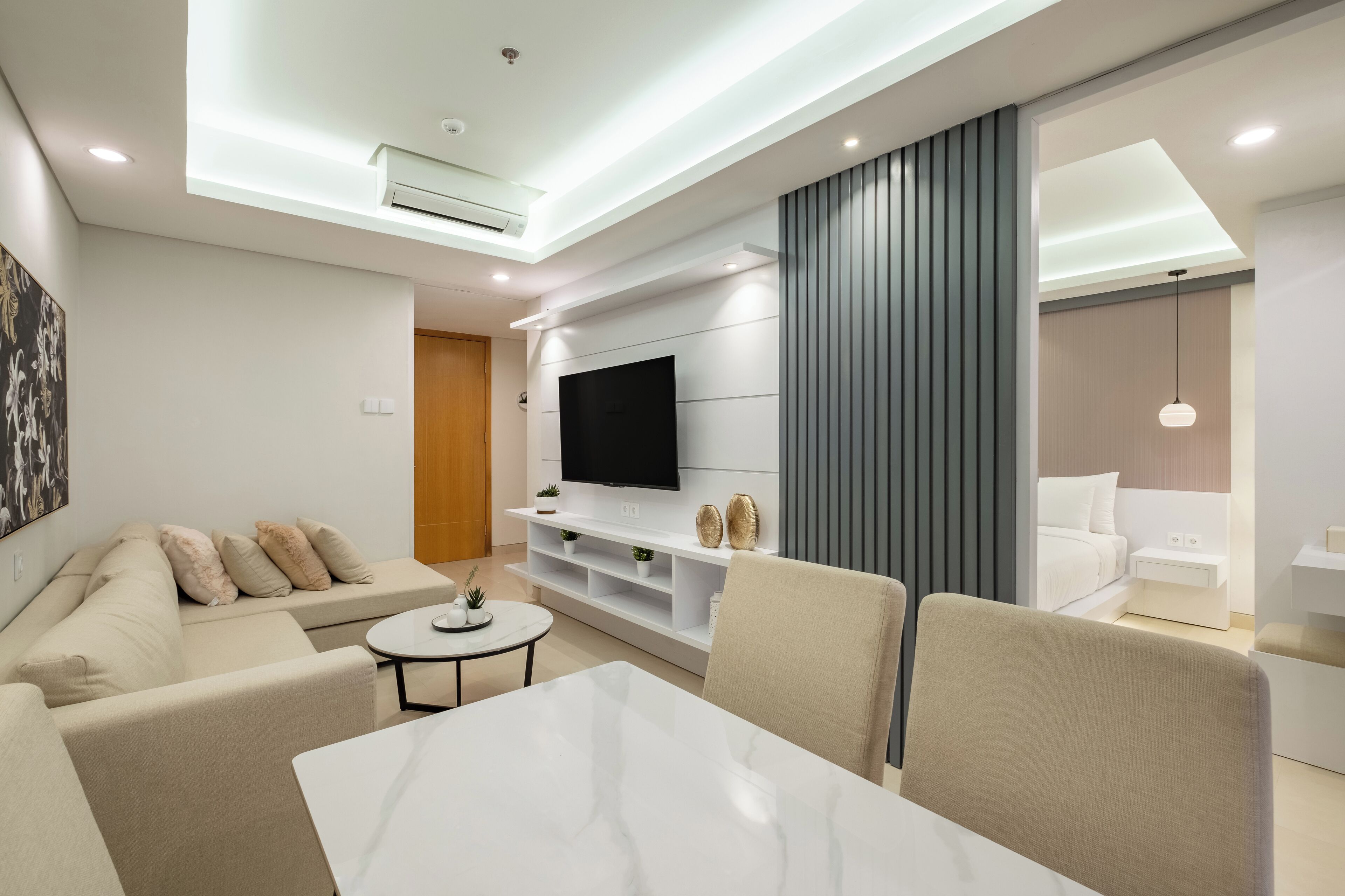 Deluxe Apartment | Living area | 60-inch Smart TV with cable channels, Netflix, streaming services