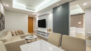 Deluxe Apartment | Living area | 60-inch Smart TV with cable channels, Netflix, streaming services - Luxe 2BR Unit Apartment in Nusa Dua (Nusa Dua)