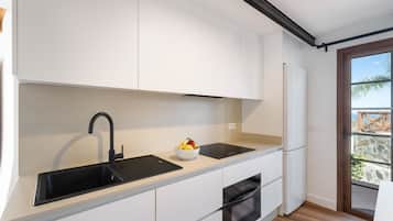 Fridge, microwave, stovetop, coffee/tea maker