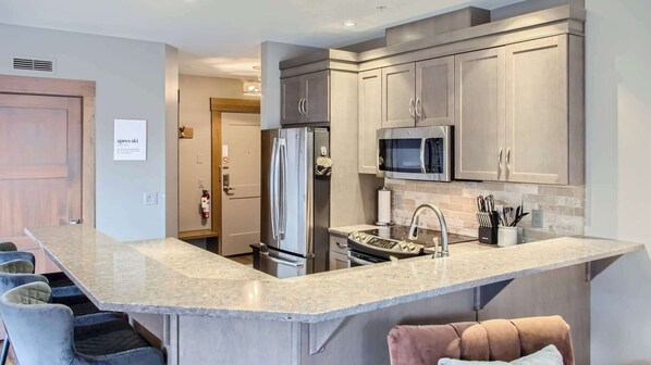 Fridge, dishwasher, coffee/tea maker