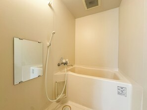 Apartment, Non Smoking (404) | Bathroom | Combined shower/bathtub, hair dryer, slippers, towels - Meteore kitamaruyama (Sapporo)