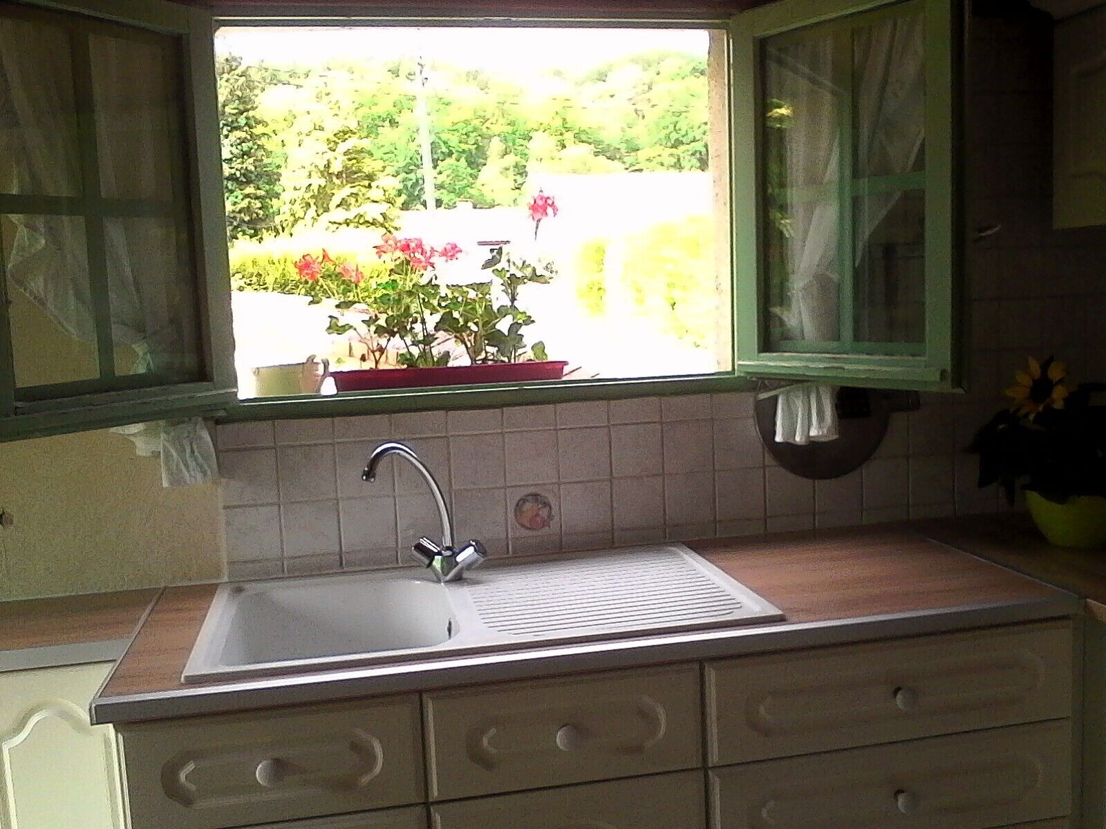 Fridge, microwave, coffee/tea maker, cookware/dishes/utensils