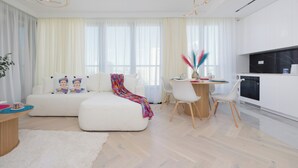 Apartment, 1 Bedroom, Balcony | Living room | 65-inch Smart TV with cable channels - Grzybowska Apartment by Renters Prestige (Warsaw)