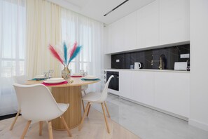 Apartment, 1 Bedroom, Balcony | Private kitchen | Fridge, microwave, oven, stovetop - Grzybowska Apartment by Renters Prestige (Warsaw)