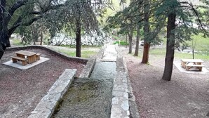 A picnic area with stone benches and a small water feature. - The Beautiful Views II (Noalejo)