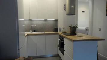 Een magnetron, een oven, een kookplaat