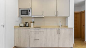 Microwave, stovetop, electric kettle, toaster