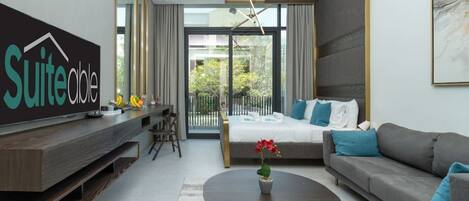 1 bedroom, desk, iron/ironing board, travel crib