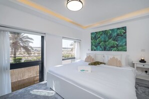 1 bedroom, desk, iron/ironing board, travel crib