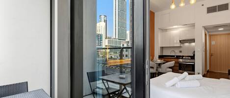 1 bedroom, desk, iron/ironing board, travel cot