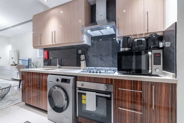 Microwave, oven, stovetop, coffee/tea maker