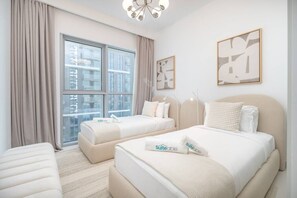 3 slaapkamers, een strijkplank/strijkijzer, reisbedje, wifi