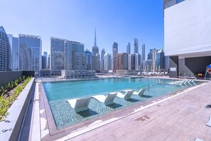 Pool - Azure accents apartment with Burj Khalifa view (Dubai)