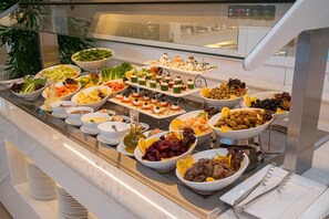 Daily buffet breakfast (SAR 75 per person)