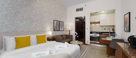 1 habitación, tabla de planchar con plancha, cuna de viaje y wifi