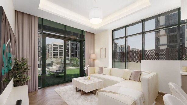 A modern living room with a sofa, coffee table, and a view of the city through large windows. - Chic 1BR Apartment in Azizi Riviera, Meydan (Dubai)