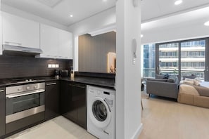 Coffee/tea maker, fridge, microwave, oven