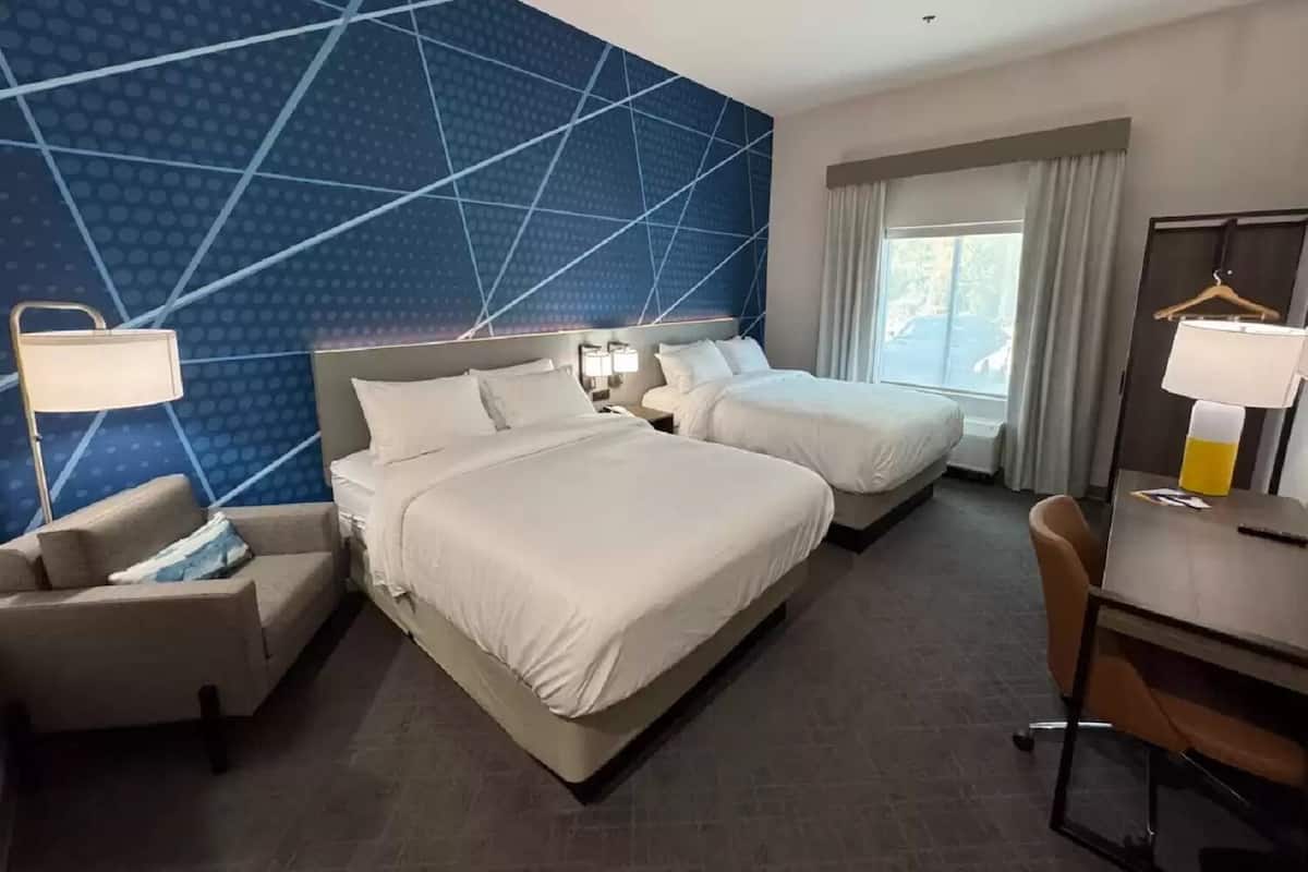 Down duvets, pillow-top beds, blackout curtains, iron/ironing board