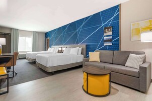 Down comforters, pillowtop beds, blackout drapes, iron/ironing board