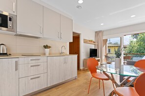 Fridge, microwave, stovetop, electric kettle