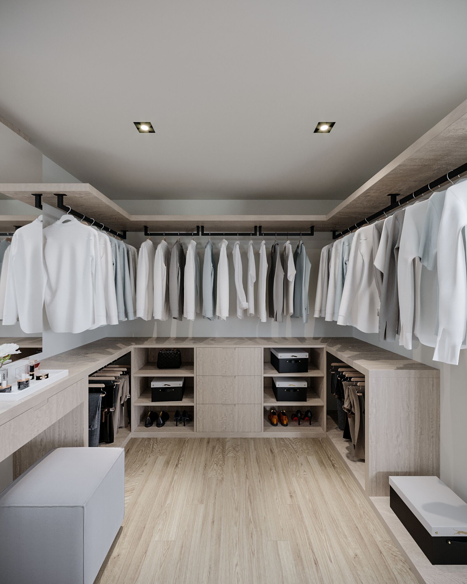 A modern walk-in closet with organized shelves, hanging storage, and a bench.