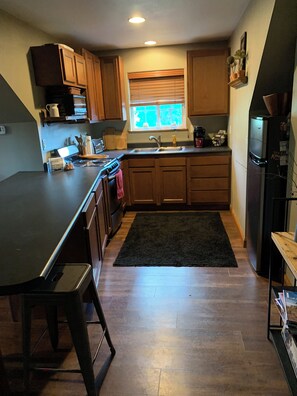 Private kitchen - Charming loft with lake view in Wagner.  (Wagner)