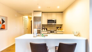 Fridge, microwave, oven, stovetop - Modern Apt with City Views and Gym (Boston)