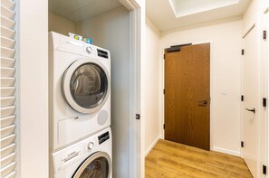 Convenient laundry area with a washer and dryer.