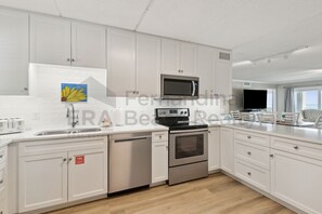 Condo, 3 Bedrooms | Private kitchen - 557 Amelia By The Sea 3 Bedroom Condo by RedAwning (Fernandina Beach)