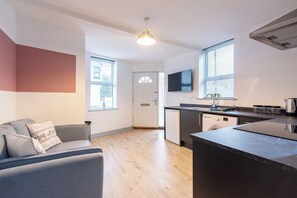 Apartment, 2 Bedrooms | Living area | Flat-screen TV