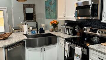 Fridge, microwave, dishwasher, coffee/tea maker