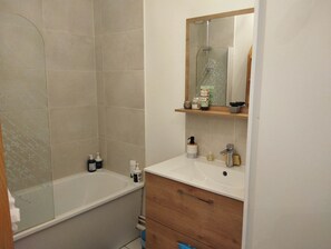 Hair dryer, towels, soap, toilet paper