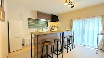 Fridge, microwave, stovetop, cookware/dishes/utensils