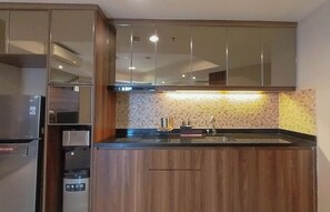 Deluxe Apartment | Private kitchen - Comfy 2Br At The Mansion Kemayoran Apartment (Jakarta)