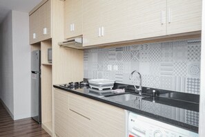 Deluxe Apartment | Private kitchen | Full-sized fridge, microwave, stovetop, rice cooker - Stunning 2Br Apartment At The Mansion Kemayoran (Jakarta)