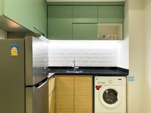 Leilighet – deluxe | Eget kjøkken | Kjøleskap, kokeplater, riskoker og spisebord