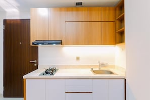 Appartement Deluxe | Cuisine privée | Réfrigérateur, surface de cuisson, cuiseur à riz