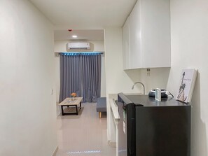 Apartment | Private kitchen - Simple 2BR at Meikarta Apartment (Cikarang)