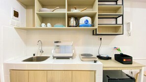 Estúdio | Cozinha privada | Frigobar, cooktop, panela elétrica de arroz