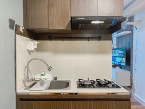 Estúdio | Cozinha privada | Geladeira, cooktop, panela elétrica de arroz