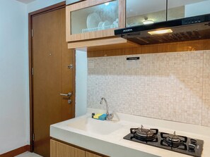 Private kitchen - Restful And Homey 1Br At Signature Park Grande Apartment (Jakarta)