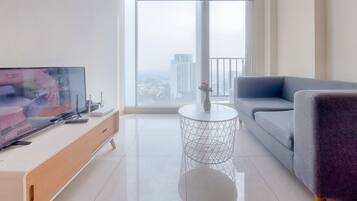 Apartamento Deluxe | Zona de estar