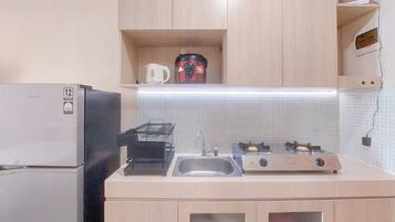 Estúdio | Cozinha privada | Geladeira, cooktop, panela elétrica de arroz