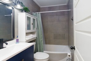 Hair dryer, towels, soap, shampoo