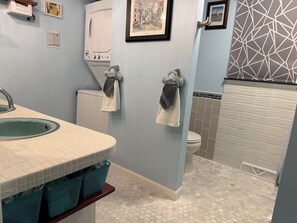Hair dryer, towels, soap, shampoo