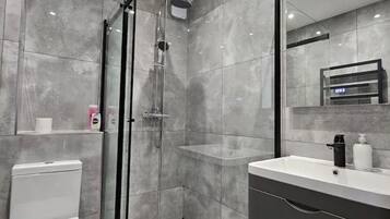 Hair dryer, towels, soap, shampoo