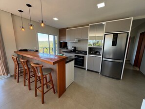 Honeymoon House, Pool Access, Beach View | Private kitchen | Dining tables