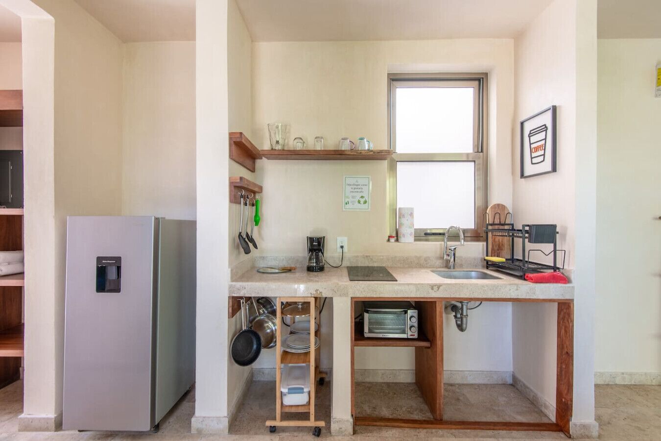 Coffee/tea maker, fridge, toaster, cookware/dishes/utensils