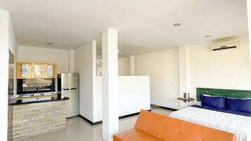 Suite estudio exclusiva | Área de sala de estar