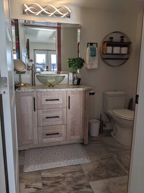 Hair dryer, towels, soap, shampoo